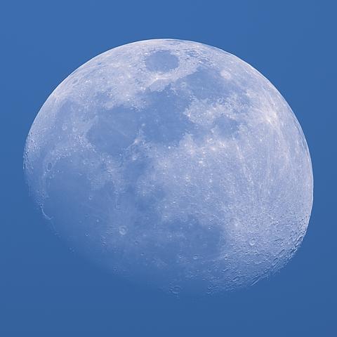 photo of the moon during the day