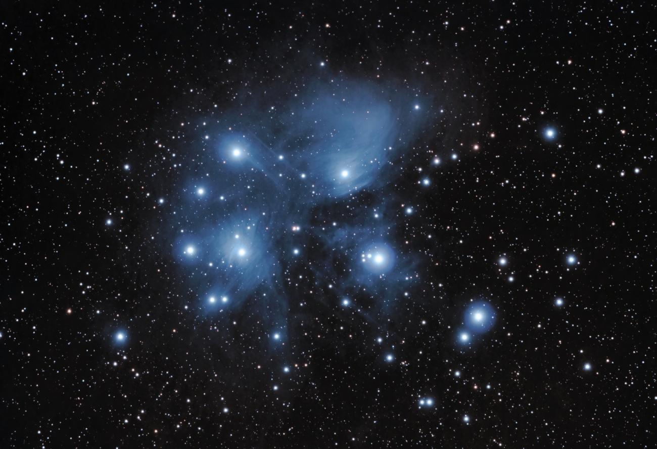 photo of the Pleiades star cluster and nebula