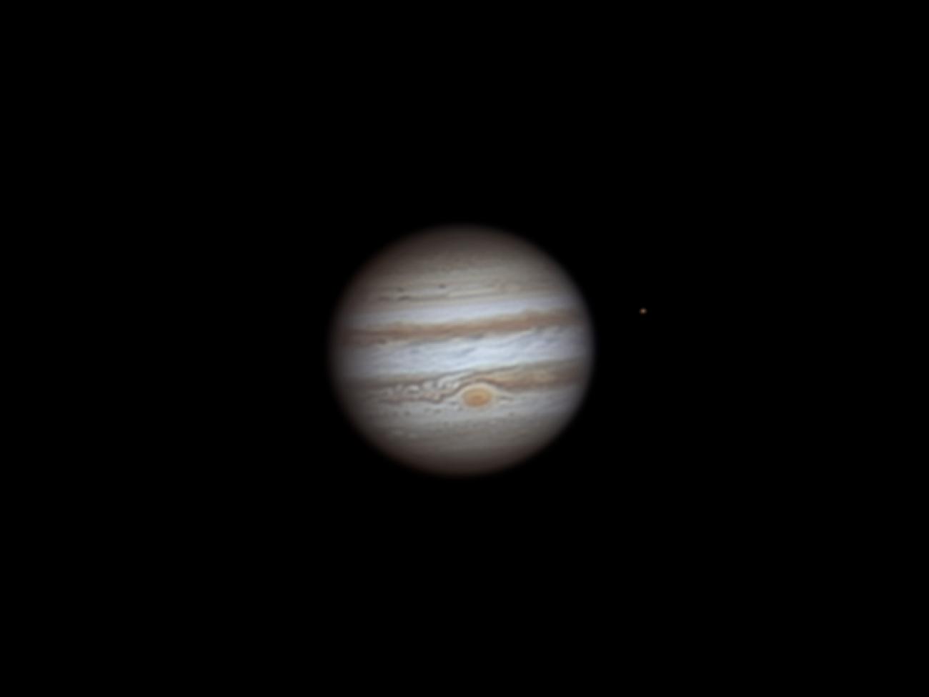 photo of jupiter and its moon io