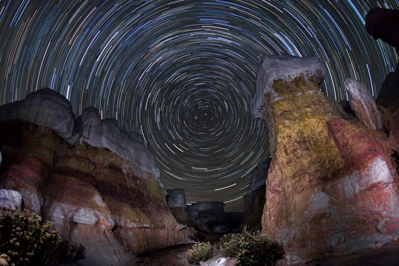 photo of star trails and rock formations