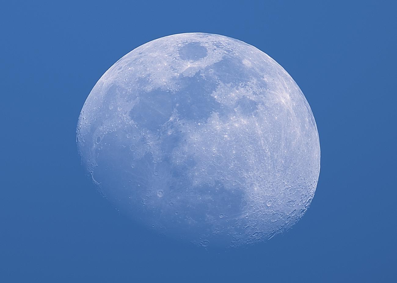 photo of the moon during the day