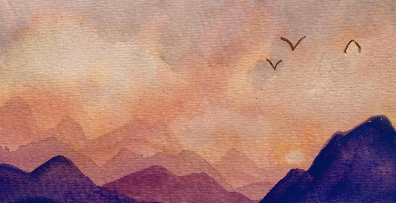 A photograph of a watercolor painting of birds flying above a mountain range at sunset